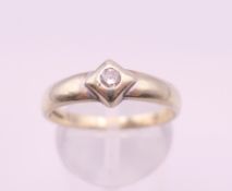 A 9 ct white gold diamond ring. Ring size Q/R. 2.7 grammes total weight.