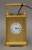 A gilt bronze cased carriage clock. 16 cm high.