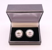 A pair of Team Bentley cufflinks. 1.75 cm diameter.