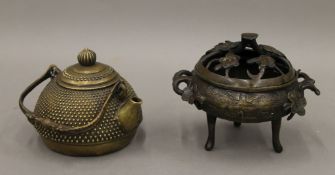 A Chinese bronze teapot with four character seal mark to base and a bronze incense burner.