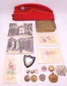 A 1914 Christmas tin with badges, a Middlesex Yeomanry side cap,