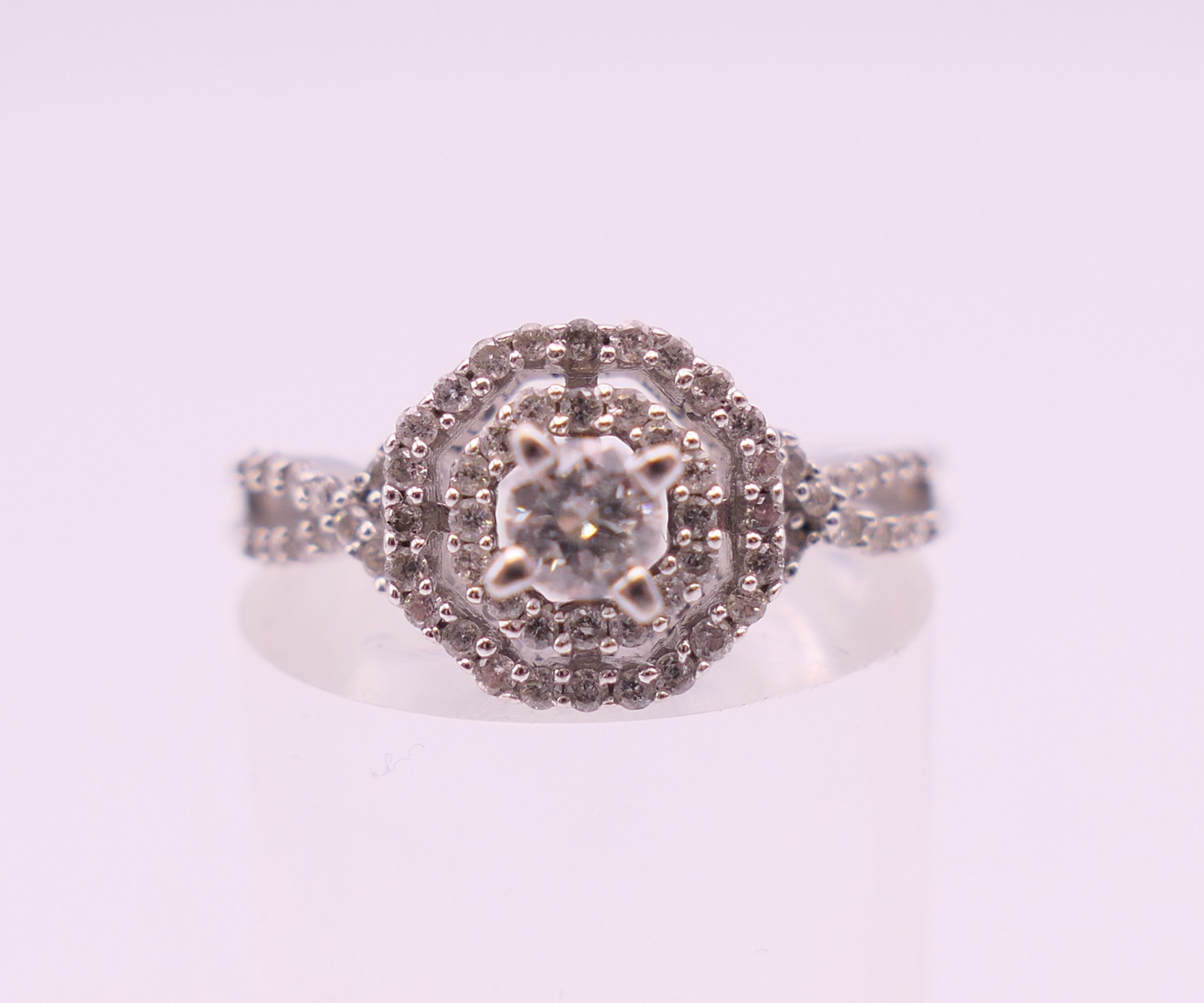 A 14 K white gold diamond ring. Ring size L/M. 3.6 grammes total weight. - Image 2 of 8