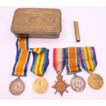 A 1914 Christmas tin with five medals including a trio awarded to 4941 1AM C A BATMAN RFC,