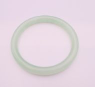 A celadon bangle. 6.25 cm interior diameter.