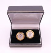 A pair of Patek Philippe cufflinks. 1.75 cm diameter.