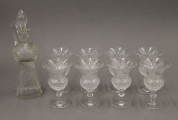 An engraved cut crystal drinking set.