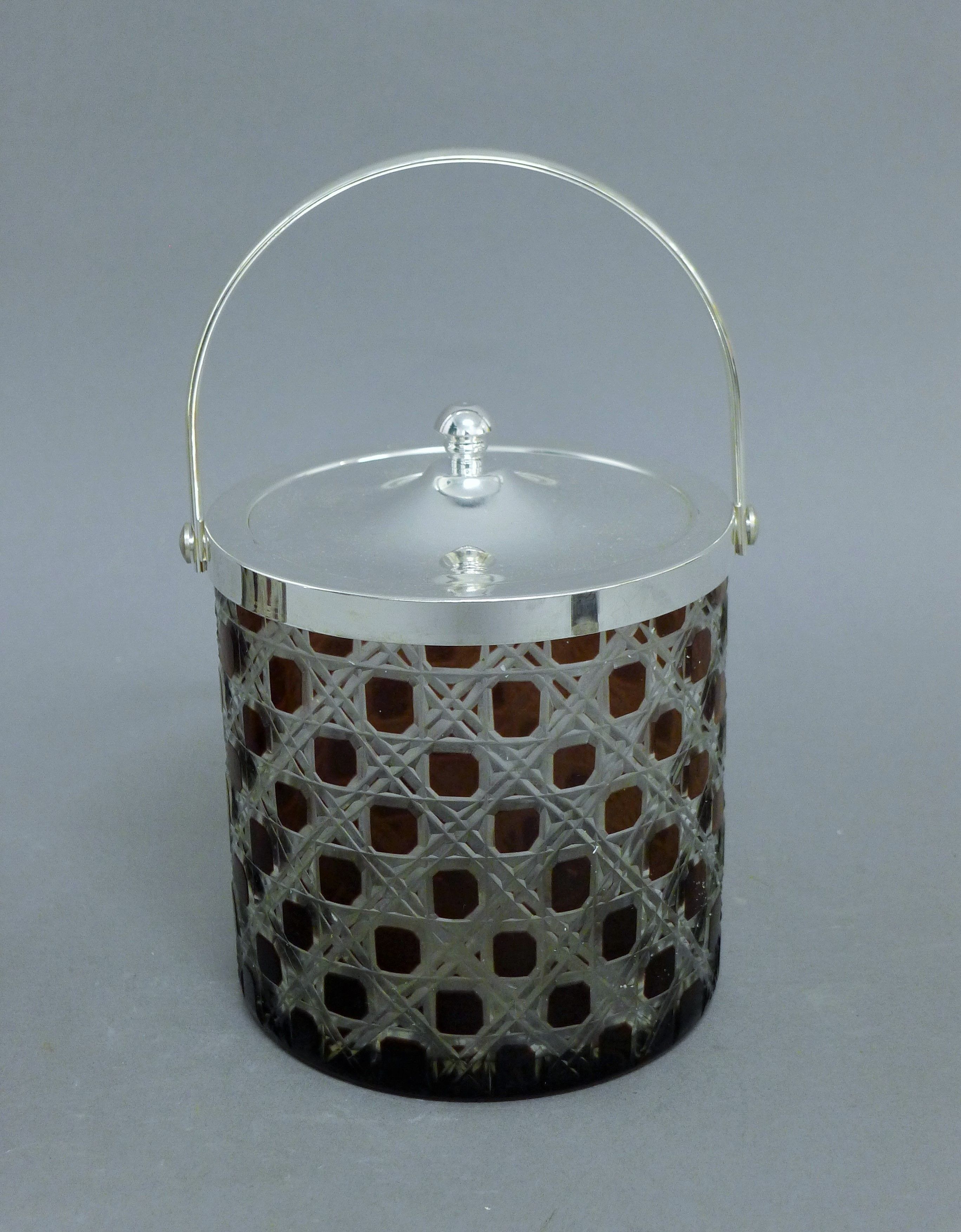A pair of silver plated and ruby glass biscuit barrels. 21 cm high overall. - Image 2 of 4