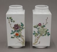 A pair of 20th century Chinese cong shaped famille rose porcelain vases. 23 cm high.