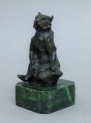 A bronze model of a bear. 16 cm high.