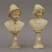 A pair of late 19th/early 20th century alabaster busts of a boy and a girl,
