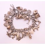 A silver charm bracelet. 112 grammes.