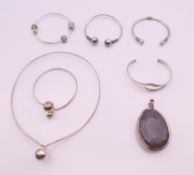 A quantity of silver jewellery, including bangles, bracelets, pendant and necklace. Pendant 6.