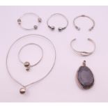 A quantity of silver jewellery, including bangles, bracelets, pendant and necklace. Pendant 6.