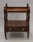 A 19th century mahogany two-tier whatnot. 70.5 cm high.