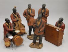 A set of six large resin jazz band figures. The pianist 38 cm high.