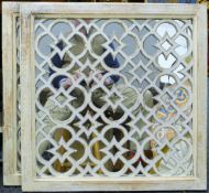 A pair of white painted Moroccan style mirrors. 65 cm square.