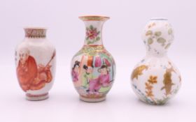 Three Chinese miniature vases. Tallest two each 8.5 cm high.