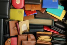 A quantity of new leather purses, etc.