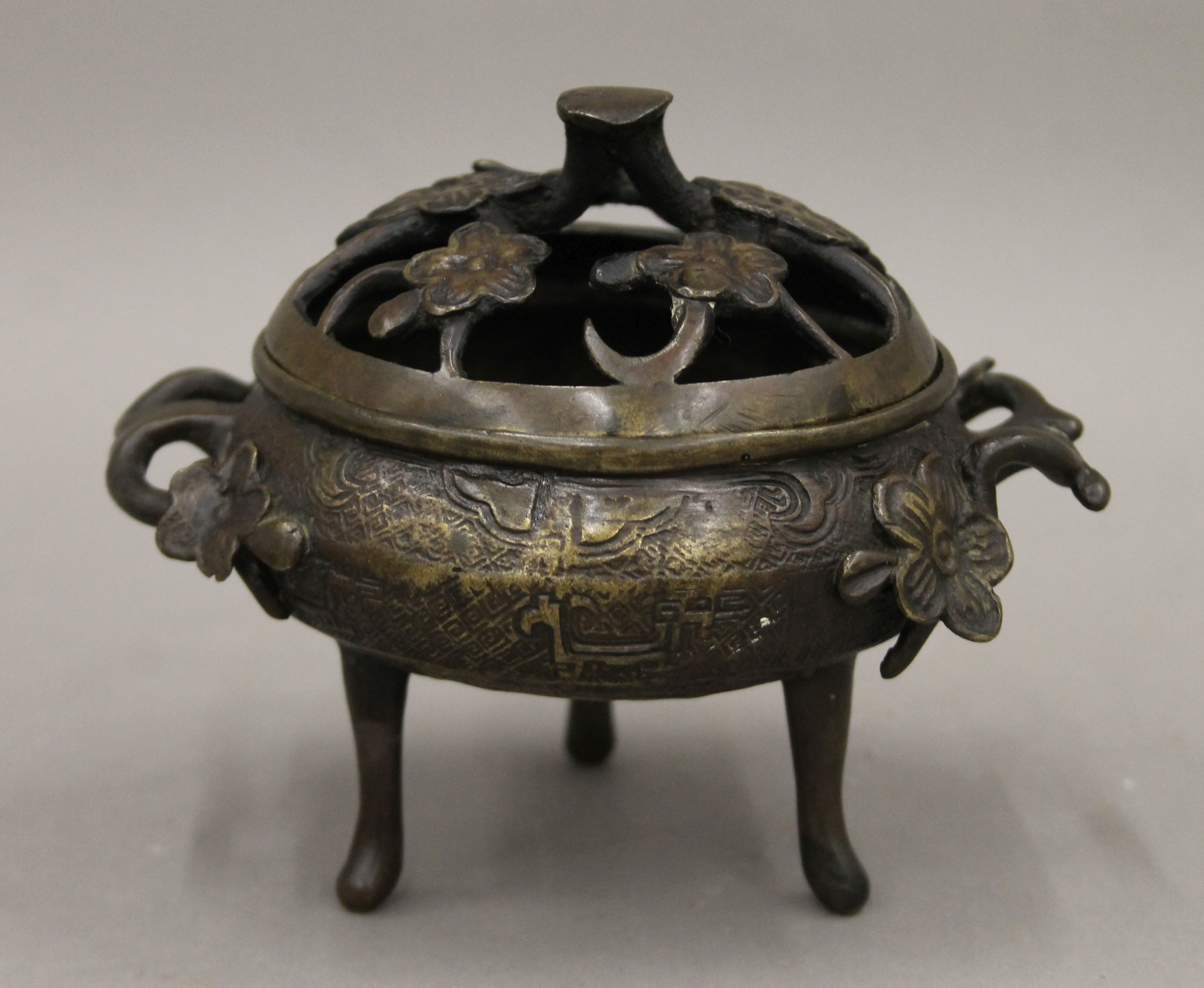 A Chinese bronze teapot with four character seal mark to base and a bronze incense burner. - Image 2 of 10