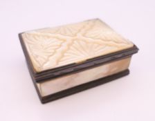 A 19th century mother-of-pearl set snuff box. 6.5 cm wide.