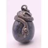A silver and lapis egg formed pendant. 2.5 cm high.