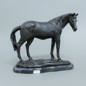 A bronze model of a horse. 22.5 cm high.