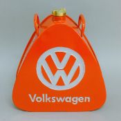 A red VW oil can. 33 cm high.