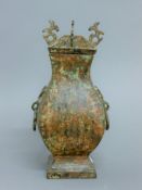 A Chinese archaic style bronze lidded vase. 28.5 cm high.