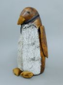 A leather penguin doorstop. 37 cm high.