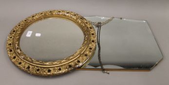 A mid-century retro bevelled mirror with scalloped edges,