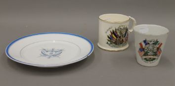 A Limoges plate inscribed 'Societe Royale Des Francs Arbaletriers A Ypres' and two WWI