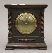 A Mappin and Webb oak mantle clock. 20.5 cm high.