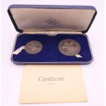 A Britannia silver proof two coin set, Prince of Wales Investiture 1969, boxed with certificate.