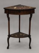 A aesthetic period walnut side table decorated in the Japanese manner, with lift up fan shaped lid.