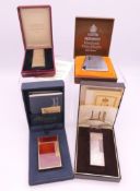 Four boxed vintage cigarette lighters, including Dunhill, Ronson and Dupont. Dunhill 6.5 cm high.