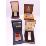 Four boxed vintage cigarette lighters, including Dunhill, Ronson and Dupont. Dunhill 6.5 cm high.