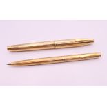 A Sheaffer fountain pen with 14 K gold nib and a Shaeffer ballpoint pen.