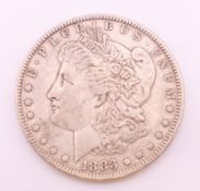 An 1883 Morgan silver dollar coin.