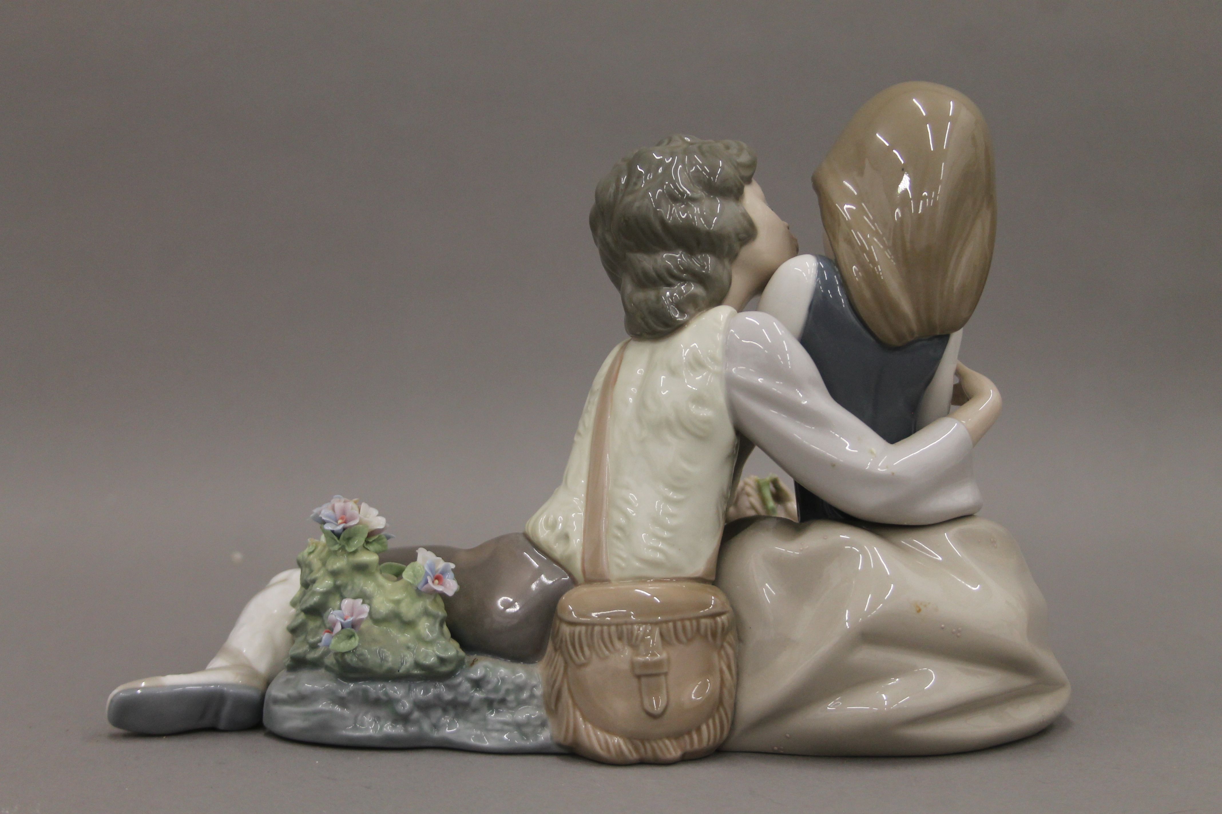 A Lladro figural group. 23 cm wide. - Image 5 of 7