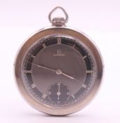 An Omega MS861 open face pocket watch. 4.5 cm diameter.