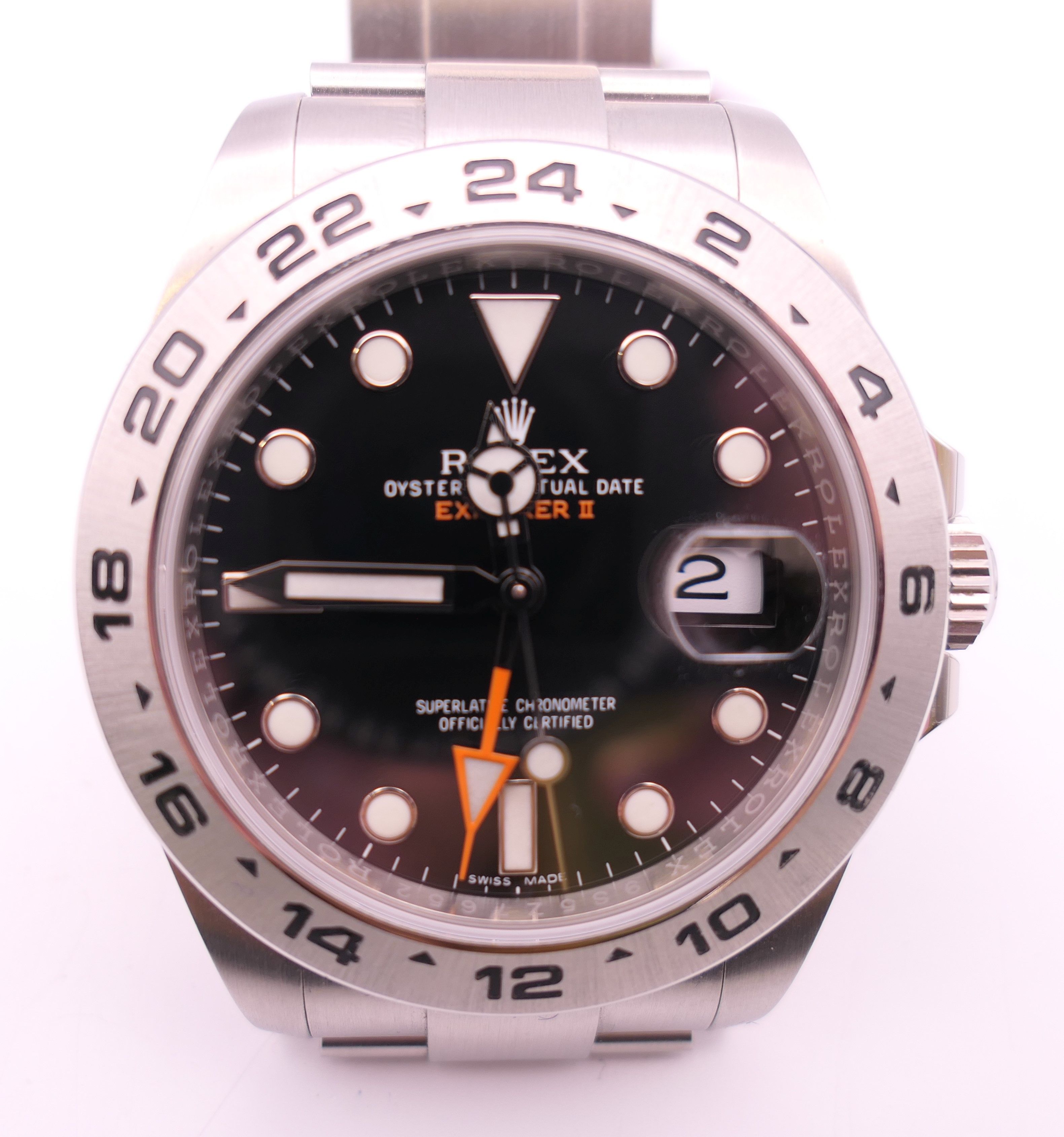 A Rolex Perpetual Date Explorer II watch with black dial, model number 216570,