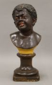 A 19th century terracotta sculpture of an African boy. 30 cm high.