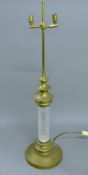 A brass and cut glass lamp. 98.5 cm high.