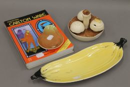 A Carltonware toad stool form cruet, a banana dish, a pear dish and three books.
