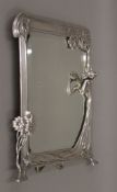 A W.M.F figural mirror. 37.5 cm high.