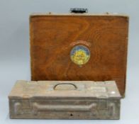 A military tin box and a boxed Duplicator. The latter 56 cm wide.