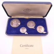 A Britannia silver proof four coin set, Prince of Wales Investiture 1969, boxed with certificate.