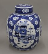 A large 19th century Chinese porcelain ovoid blue and white ginger jar painted with panels of