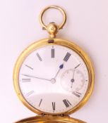 An 18 ct gold full hunter pocket watch. 4.5 cm diameter. 85.4 grammes total weight.