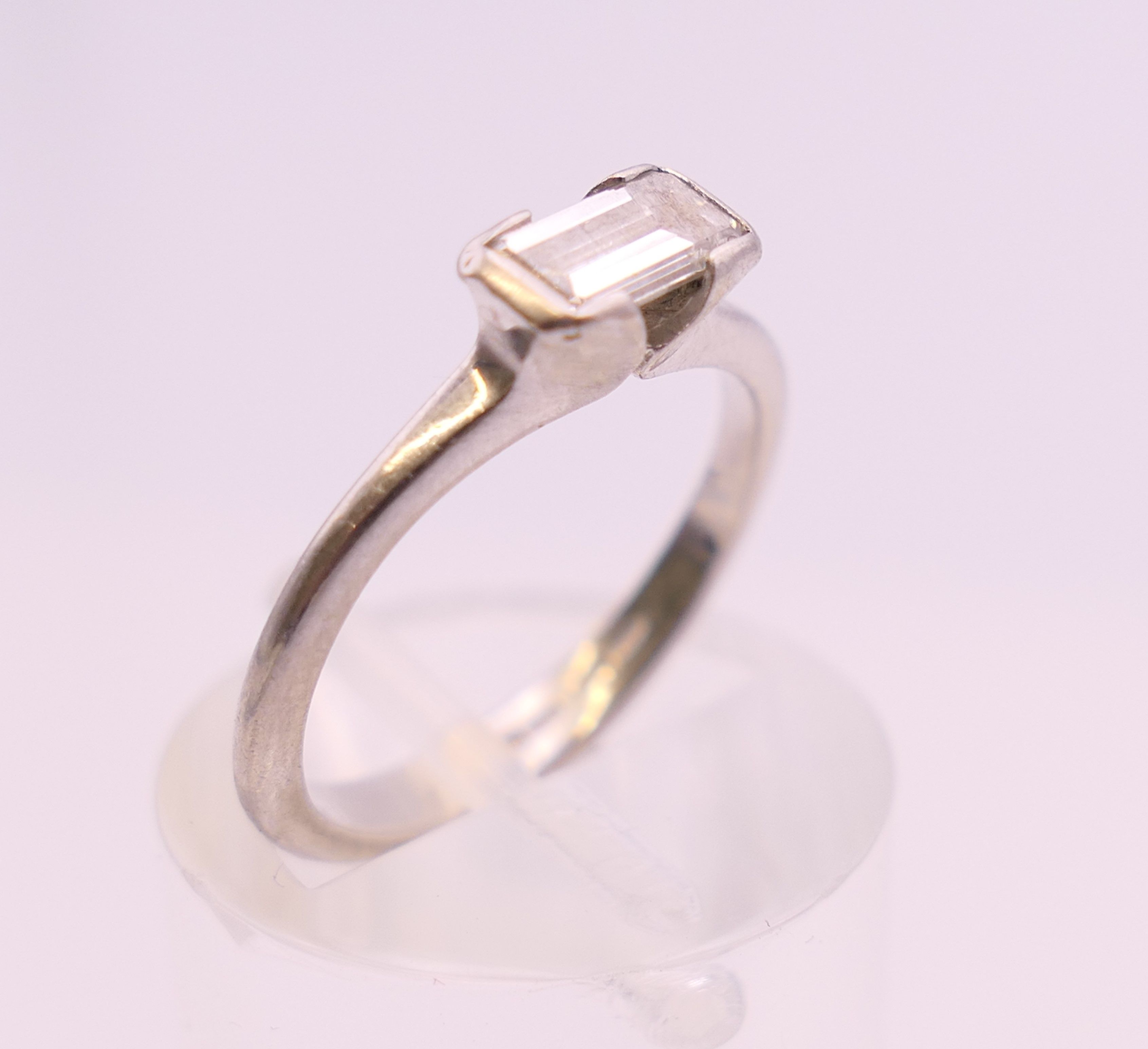 A platinum diamond solitaire ring. Ring size G/H. 3.3 grammes total weight. - Image 5 of 7